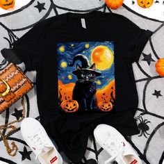 ✪ "Scary Night Cat" Van Gogh Halloween ✪ Celebrate Halloween with a twist of art and spookiness with our "Scary Night Cat" Van Gogh Halloween shirt. It's the purr-fect choice for cat lovers who adore Halloween. * "Scary Night Cat" Van Gogh-inspired Halloween shirt featuring a whimsical cat with a witch hat and mummy wrappings. * Made from comfortable, high-quality fabric perfect for Halloween enthusiasts. * Available in various sizes to suit cat lovers celebrating Halloween. * Please double chec Halloween Black T-shirt With Cat Design, Black Halloween T-shirt With Cat Design, Spooky Halloween T-shirt With Cat Design, Spooky Black T-shirt With Cat Design, Spooky Black T-shirt With Cat Print, Spooky Halloween Cat Design Top, Black Witchy Halloween T-shirt, Van Gogh Halloween, Funny Black Cats