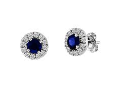 Sapphire and Diamond Halo Earring in 14k White Gold. The round sapphire in these earrings have a total carat weight of 0.60 carats. The diamonds have a total carat weight of 0.33 carats. Gia Certified Sapphire Earrings For Formal Occasions, Gia Certified Sapphire Diamond Earrings, Formal Round Diamond Earrings With Gemstones, Brilliant Round Cut Sapphire Earrings, Formal Round Sapphire Diamond Earrings, Formal Round Cut Gemstone Diamond Earrings, Round Sapphire Earrings For Formal Occasions, Sapphire Halo Design Round Cut Earrings, Sapphire Round Cut Earrings With Halo Design