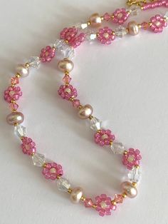 Inspired by magical girl for spring, this beautiful piece  is made from Toho beads, Swarovski crystals and freshwater pearls finished off with gold plated lobster clasp and extender to fit all sizes.🌸 Handmade Pink Crystal Beaded Necklaces, Pink Crystal Beaded Necklaces, Pink Crystal Beaded Necklace For Gift, Pink Choker Necklace, Pink Choker, Toho Beads, Clay Craft, Doll Stuff, Crystal Choker