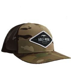 A tactically built Trucker Cap, the Half-Moon Outfitters Diamond Bird Multicam Camo Trucker hat is made with USA milled NYCO ripstop fabric. The MULTICAM camo pattern is used by branches of the US military. No crown button relieves pressure points caused by ear protection when shooting, and an adjustable snapback provides sizing versatility. Shape: MidPro Fabric: 50/50 Nyco Ripstop/Poly Mesh Visor: Precurved Sweatband: Cotton Adjustable Snapback One Size Fits Most Camo Trucker Hat, Camo Patterns, Bow Hunting, Moon Collection, Ear Protection, Ripstop Fabric, Us Military, Pressure Points, Half Moon