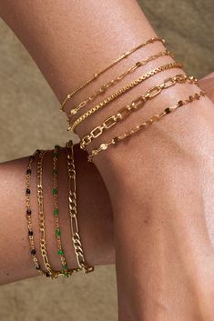 Everyone needs a simple chain that pairs well with every stack, and the Bennett bracelet is our go-to box chain. With a sleek shine that reflects from every angle, this piece is perfect for any minimalist who loves to stack. 14k Gold Fill Length: 6" + 1" ext Make your jewelry last! Click here for jewelry care. Need a gift box? We got you. Gold Bracelet Stack, Figaro Bracelet, Bracelets Beads, Figaro Necklace, Sparkle Bracelet, Simple Chain, Sparkle Necklace, Figaro Chain, Layered Bracelets