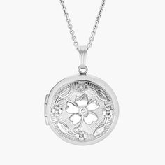 A touch of vintage style, this round locket is crafted from sterling silver and features a floral motif. The perfect keepsake, this locket is strung on a matching cable chain necklace. Engrave the back for a personalized touch. Locket Necklaces, Round Locket, Cable Chain Necklace, Silver Lockets, Blue Nile, Metal Necklaces, Cable Chain, Floral Motif, Locket