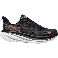 This everyday running shoe delivers lightweight, foot-hugging comfort. The HOKA Clifton 9 is a sporty women's road running shoe that is lightweight and delivers a precise mix of bounce and stability. These HOKA Clifton 9 Black/Rose Gold Mesh Women's Shoes have the following features: Open-engineered mesh construction delivers breathable comfort Early-stage Meta-Rocker brings stability to your sprints Vertical pull tab allows easy entry Lightweight mesh gusset prevents tongue migration Reinforced Hoka Clifton 9, Hoka One One Woman, Clifton 9, Hoka Clifton, Birkenstock Sandals, Flip Flop Shoes, Trail Shoes, House Shoes, Road Running