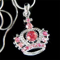 "PERFECT CHRISTMAS GIFT FOR LADIES You are getting a Princess / Queen Crown & Cross Pendant with Swarovski crystals. It comes with a FREE 18\" inches silver Plated Snake Chain necklace with lobster clasp. Crown with Cross size is 1\" (2.5cm) X 1\"(2.5cm) Crystal Color: LIGHT ROSE + ROSE Prices are in US$. For shipping policies and other important information, click on \"profile\" on the right. See an item that you like but has already been sold? Contact me to see if I have more! Thank you fo Sparkling Crystal Rhinestone Necklace Gift, Pink Princess Jewelry For Wedding, Pink Crystal Necklaces For Mother's Day, Pink Crystal Necklace For Mother's Day, Pink Crown-shaped Wedding Jewelry, Mother's Day Pink Crystal Necklace, Red Crown Jewelry For Wedding, Personalized Pink Jewelry For Christmas, Pink Crystal Rhinestone Necklace For Wedding