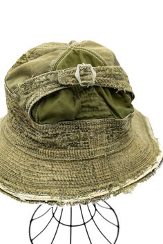 Color: Khaki Hat made of solid thick chino. Reinforced stitches that fill all sides of the brim and more than half of the crown look like a decoration. Distressed version by craftsmen from KOUNTRY There are individual differences for each product 100% Cotton One size Made In Japan Style #: EK-1499 Military Style Hat With Curved Brim, Green Military Brimmed Hat, Military Style Khaki Bucket Sun Hat, Green Military Hat With Curved Brim, Vintage Brimmed Hat For Outdoor, Vintage Brimmed Outdoor Hat, Adjustable Military Bucket Hat, Military Style Khaki Brimmed Bucket Hat, Military Style Adjustable Brimmed Sun Hat