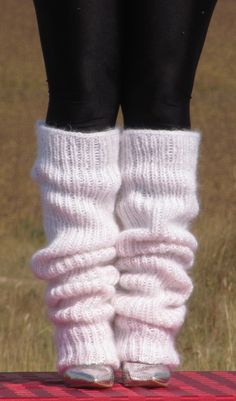 HAND KNITTED GAITERS / LEG WARMERS ### DESIGNED & CREATED by Giorgio Qualitat ### Product Specification: §  Color:         White; §  Style:          Ribbed hand knitted gaiters; §  Material:     2 strands premium class longhair mohair; Size & Measurements: §  Length: 40.9 " / 104 cm §  Circumference at the upper end:    19.7 '' / 50 cm §  Circumference at the lower end:     9.4 '' / 24 cm §  Net weight: 488 g All measurements are taken with the item laid flat and not stretched. The lady modeling Aesthetic Leg Warmers, Leg Warmers Aesthetic, White Leg Warmers, Knitted Leg Warmers, Knit Leg Warmers, Aesthetic Ideas, Birthday List, Clothes Ideas, The Lady