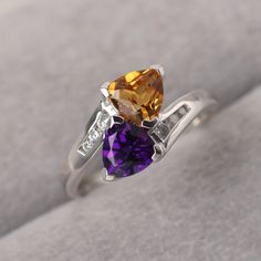 ◆ Combined birthstone,2 birthstones ring  suit whom born on February or November,this ring will be a wonderful gifts for mother or couple,best friends.     A piece fits for elegance, suitable for engagement, party, daily occasion. ◆ Production Description: Main stone Type: Citrine and Natural Amethyst (2 stones can change to what you want) Main Stone Shape:Trillion cut Main Stone Size: 6*6 mm Side stone: CZ Metal: 925 Sterling silver - Other options available in the drop down menu ◆ Customizatio Citrine Gemstone Birthstone Ring For Promise, Citrine Birthstone Ring With Gemstone For Promise, Promise Ring With Citrine Birthstone, Amethyst Birthstone Ring With Accent Stones For Promise, Topaz Birthstone Promise Ring Fine Jewelry, Fine Jewelry Topaz Birthstone Promise Ring, Topaz Birthstone Promise Ring In Fine Jewelry Style, Wedding Birthstone Cubic Zirconia Gemstones, Wedding Cubic Zirconia Birthstone Gemstones