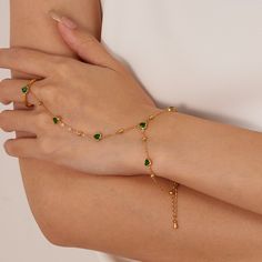 ✦ Unleash your colorful and playful side with our Evil Eye Pearl Slave Ring Hand Chain Bracelet! This bohemian-inspired piece features a butterfly and lucky clover leaf with pearl beads, perfect for any beach party or formal occasion. The adjustable open cuff ensures a perfect fit, while the gold-plated stainless steel is hypoallergenic. Get ready to rock this Y2K feel all summer long! ----------- DETAILS ----------- - Color: Gold - Pattern: Style 1- Style 8 - Size: Please refer to the parameter of each ring chain bracelet - Ring Size: Open & Adjustable - Materials: Gold Plated, Surgical Steel, Cubic Zirconia, Glass, Enamel *Stainless Steel is hypoallergenic, generally safe for sensitive skin. - SKU: TYB006 Bracelet Attached To Ring, Ring With Bracelet Attached, Chain Ring Bracelet, Ring Y2k, Hand Chain Bracelet, Ring Bracelet Chain, Ring Chain, Ring Hand, Heart Shaped Rings