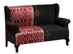 a black couch with red and gold designs on it