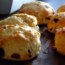 several scones are sitting on a baking sheet