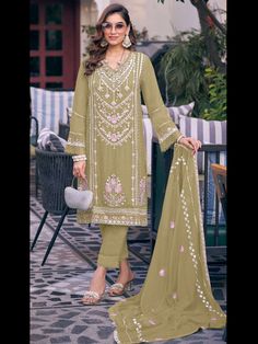 Classy Designer Salwar Suit Collection Processing Time : 7 Business Days Work : Embroidery Sequence Work Fabric:Top : Heavy Fox Georgette  Bottom : Heavy Dull Santoon Dupatta : Heavy Fox Georgette  Color:Top : Mehndi Green Bottom : Mehndi Green Dupatta : Mehndi Green Salwar Kameez Mens, Suit With Dupatta, Patiyala Dress, Bottom Heavy, Lehenga Suit, Churidar Suits, Georgette Dupatta, Salwar Kameez Online, Designer Salwar Suits