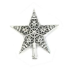 a silver metal star with filigrees on it