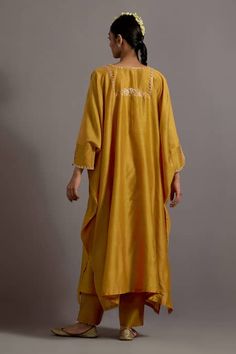 Buy Yellow Chanderi Hand Embroidered Zari Notched Yoke Kaftan With Pant For Women by Deep Thee Online at Aza Fashions. Yellow Raw Silk Kurta With Dabka, Yellow Raw Silk Kurta With Dabka Detailing, Yellow Dabka Raw Silk Kurta, Yellow Silk Anarkali Set With Dabka Embroidery, Yellow Silk Anarkali Set With Dabka Detailing, Yellow Silk Anarkali Set With Dabka, Yellow Raw Silk Palazzo Set With Dabka Work, Yellow Silk Salwar Kameez With Dabka Detail, Yellow Silk Sharara With Dabka