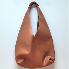 Color/Material - Caramel Genuine Leather Design Details - Beautiful Smooth Leather Tote Bag With Details On The Shoulder Strap, Snap Closure Measures 15" Wide X 21" High To Shoulder Strap X 5" Deep, Approximately. Excellent Used Condition. Carmel Color, Leather Hobo Bag, Leather Design, Leather Tote Bag, Hobo Bag, Smooth Leather, Leather Tote, Snap Closure, Design Details