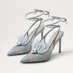 Step into elegance with these light blue mesh stitching floral decor pearl lace-up wedding heels. Featuring intricate detailing, they blend sophistication with a touch of whimsical charm for your special day. Color: Light blue Material: Mesh/Satin Heel Type: Stiletto heel Heel Height: 4.09'' / 104 mm approx Product measurements were taken using size 8. Please note that measurements may vary by size. Toe: Pointy toe Stitching floral decor design Pearl lace-up deign Toe cap design Handcrafted US sizing. Fits true to size. Light Blue Wedding Shoes, Light Blue Heels, Whimsical Shoes, Blue Wedding Shoes, Floral Heels, Blue Accessories, Bridal Heels, Pearl And Lace, Satin Heels