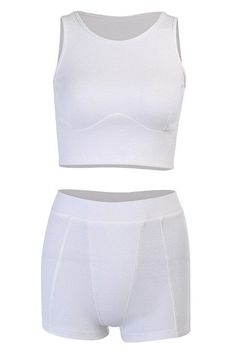 The Hensely Lounge Set is a matching lounge set with underbust and front seam details. Made from 70% Cotton 30% Polyester Stretchy Ribbed Fabric Cropped and Form Fit Model is 5'10" with measurements 34" 27" 36" wearing a size small Eco friendly made to order piece, please allow 6-14 day for processing. Fitted Two-piece Solid Top, Fitted Seamless Cropped Bottoms, Fitted Solid Two-piece Loungewear Set, Solid Two-piece Fitted Bottoms, Solid Fitted Two-piece Bottoms, Fitted Solid Two-piece Bottoms, Fitted White Two-piece Set, Fitted Two-piece White Top, Fitted White Two-piece Top