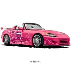 a pink sports car with graffiti on the side