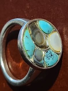 Round Enamel Ring With Inlay, Unique Turquoise Opal Ring With Multi-stone Design, Unique Turquoise Multi-stone Opal Ring, Turquoise Multi-stone Ring For Gift, Turquoise Multi-stone Round Opal Ring, Multicolor Multi-stone Turquoise Ring, Unique Turquoise Multi-stone Rings, Bohemian Multi-stone Turquoise Ring, Unique Multicolor Cabochon Turquoise Ring