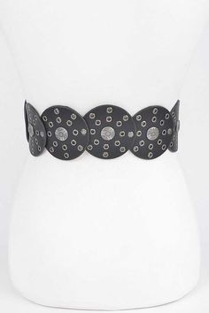 elevate your style with the faux leather rivet studded belt. this stunning belt features an engraved buckle and faux leather material, accented with rivet studs for an edgy touch! with a width of 3" and a length of 40.5", it's perfect for adding a bold statement to any outfit! available in black, caramel, and silver. browse more accessories! details & measurements width 3" length 40.5" polyurethane, iron, lead & nickel compliant Edgy Adjustable Belt With Rivets, Edgy Adjustable Belts With Rivets, Black Belt With Removable Feature For Festivals, Black Adjustable Gothic Belt, Trendy Black Belt For Festival, Adjustable Black Belts With Rivets, Edgy Black Belt Buckles, Adjustable Black Belt With Studs, Adjustable Black Belts With Studs