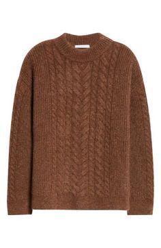 The Danish designer's signature mixture of texture and shape is at its cozy best in this roomy cable-knit sweater made from a rich blend with warm mohair and wool yarns. 27" length (size Medium) Crewneck Long sleeves Ribbed cuffs and hem 38% mohair, 30% wool, 29% polyamide, 3% elastane Dry clean or machine wash, dry flat Imported Designer Clothing Fall Mohair Cable Knit Sweater, Cozy Mohair Sweater With Cable Knit, Cozy Mohair Cable Knit Sweater, Elegant Oversized Cable Knit Sweater, Oversized Mohair Cable Knit Sweater, Elegant Brown Cable Knit Sweater, Cecilie Bahnsen, Brown Fall, Mohair Wool