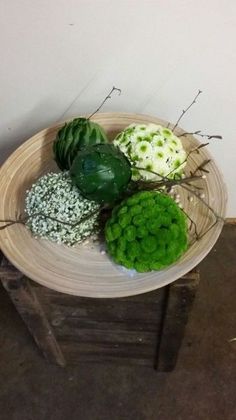 three different types of flowers on a plate