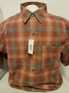 NEW Redhead Men's Plaid Short Sleeve Button Up Shirt  Size Medium NEW - ITEM DOES NOT HAVE ORIGINAL TAGS - ONLY GENERIC STORE TAGS ATTACHED, BUT ITEM IS NEW AND HAS NEVER BEEN WORN listing 814 Feel free to contact me with any questions  RETURN POLICY: In following the guidelines from EBAY, if you need to return an item, it must be returned in the same condition in which it was received and it must include all tags (if item was new). If the returned item does not have original tags (if Plaid Cotton Short Sleeve Shirt With Button Closure, Casual Cotton Short Sleeve Shirt With Snap Buttons, Redhead Men, Mens Plaid, Plaid Shorts, Short Sleeve Button Up, Button Up Shirt, Up Shirt, Button Up Shirts