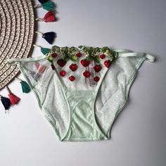 Victoria's Secret Dream Angels Strawberry Embroidery Cheekini Panty Pale Green M New Condition: New In Package Size: Medium Color: Pale Green Life Is Sweet, And So Is This Feminine Pair. Hand Embroidered With Strawberries For A Fresh-Picked Look, And Complete With A Sheer Mesh Back. String Bikini Low Rise Embroidered Tulle Mesh Cotton Panel Gusset Minimal Back Coverage; Lots Of Cheek Peek Machine Wash Imported Summer Stretch Bottoms With Floral Embroidery, Stretch Bottoms With Floral Embroidery For Summer, Floral Embroidered Stretch Bottoms For Summer, Victoria's Secret Red Summer Bottoms, Victoria's Secret Red Bottoms For Summer, Summer Red Bottoms By Victoria's Secret, Summer Stretch Embroidered Bottoms, Summer Embroidered Stretch Bottoms, Strawberry Embroidery