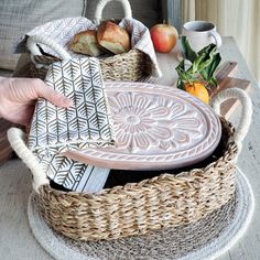 "[About This Handmade Bread Warmer] Looking for a unique and handmade gift for a baker or home entertainer? Check out this bread and tortilla warmer set from Gift Shop BY KORISSA! The set includes a ceramic stone for warming bread and tortillas, and a wicker woven basket. This set makes for a great hostess gift, new home gift, housewarming gift, wedding gift, newlywed gift, anniversary gift, mom birthday gift, or gift for her or him. Perfect for anyone who loves to bake or entertain at home! 🎁 For Add-On Personalized Wooden Gift Tag Options for Gift Box, Click the link below.  https://www.etsy.com/listing/1550716620/personalized-wooden-gift-tag-add-on-gift Our terracotta plate has been engraved with a flower design and cut to fit neatly into a wicker basket. This special bread warmer is n Terracotta Plate, Bread Warmer, Screen Print Tea Towels, Handmade Bread, Oval Basket, Tortilla Warmer, Seagrass Basket, Printed Tea Towel, Basket Gift