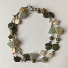 Materials Used: dyed shells, glass seed beads, Unakite beads, and 2 different rock/stone beads.  Necklace Lengths: 17.5 inches and 18 inches. These necklaces are heavier than "normal" necklaces and weigh around 2.5 oz each. Always Handmade 💖 Unakite Crystal, Rock And Stone, Glass Bead Jewelry, Glass Beads Jewelry, Green Earth, Matching Necklaces, Stone Rocks, Handmade Necklace, Earth Tones