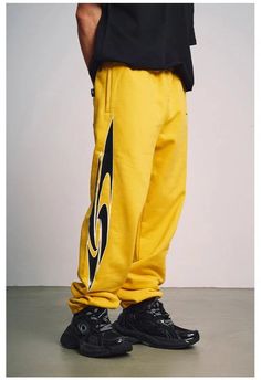 Size (in cm) S M L XL 2XL Length 108 110 112 114 116 Waist 66 70 74 78 82 Hip 112 116 120 124 128 More Sizing Information Below Yellow Athleisure Pants For Streetwear, Streetwear Yellow Pants With Elastic Waistband, Yellow Pants With Elastic Waistband For Streetwear, Yellow Bottoms With Elastic Waistband For Streetwear, Casual Full-length Yellow Bottoms, Yellow Athleisure Bottoms For Streetwear, Casual Yellow Sweatpants For Streetwear, Yellow Bottoms With Pockets For Winter, Yellow Winter Bottoms With Pockets