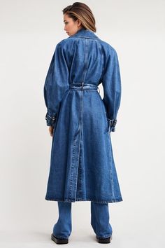 This Denim Trenchcoat with Belt is a stylish outerwear piece that combines the classic design of a trench coat with the casual appeal of denim. The coat is dark blue and features a collar and lapels, giving it a sophisticated look. It comes with a belt that can be tied around the waist, allowing you to adjust the fit to your liking.Fabric: Cotton, Polyester The 90s Fashion, Denim Coat Women, Denim Trench Coat, Swimwear Cover Ups, Swimwear Cover, Denim Coat, Stay Cozy, Swimwear Tops, Winter Collection