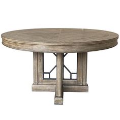 an oval dining table with two pedestals on each side