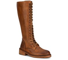 Vintage-inspired style for the modern woman, the Sadelle tall boot is uniquely styled with a leather upper that hits at the knee, a bold lace-up front, and fun striped laces. From Vintage Foundry Co. Wide Calf Leather Boots For Women, Casual Knee-high Lace-up Boots, Brown Wide Calf Knee-high Lace-up Boots, Brown Knee-high Wide Calf Lace-up Boots, Knee-high Combat Boots With Laces For Fall, Knee-high Leather Platform Boots With Lacing, Spring Leather Knee-high Combat Boots, Brown Knee-high Lace-up Boots For Spring, Knee-high Leather Combat Boots With Lacing