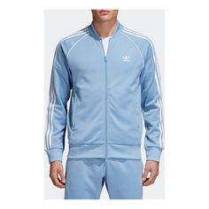 Adidas Blue Outerwear With Three Stripes, Adidas Blue Outerwear With Three Stripes Branding, Blue Sports Track Jacket With Zipper Closure, Adidas Blue Track Jacket With Three Stripes, Blue Sports Outerwear With Zipper Closure, Blue Sporty Track Jacket With Zipper, Sporty Blue Outerwear With Zip Fly, Casual Blue Track Jacket With Zipper Closure, Adidas Blue Track Jacket For Streetwear