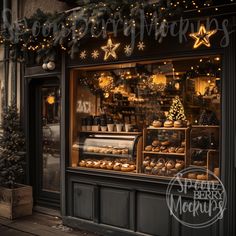 a bakery with christmas decorations and lights on the front window is lit up at night