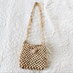 Super Cute Sea Shell Bag! Never Used All Shells Are Attached Pictured With My Hand For Sizing Rock A One Of A Kind Bag This Summer! I’m 5’4’’ And When Wearing This Bag Falls Right At My Hip *Not Urban Outfitters, Private Boutique* Urban Outfitters Travel Bags For Summer, Urban Outfitters Summer Travel Bags, Urban Outfitters Rectangular Shoulder Bag For Summer, Urban Outfitters Summer Bag For Everyday Use, Rectangular Travel Bags By Urban Outfitters, Rectangular Travel Bag From Urban Outfitters, Gold Crossbody Straw Bag For Everyday, Chic Rectangular Bags From Urban Outfitters, Urban Outfitters Rectangular Bag With Adjustable Strap