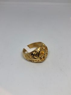 Cool Vintage Rock and Roll star men's ring Nice heavy ring, golden Stainless Steel Unused stock from the 1980's I have an assortment of sizes from 9.5, 10, 11, 12 Please add your size to the order in a message and I will send the size you require. If I am out of stock in your size, I will list the ones I have available for replacement. If I am sold out in the sizes you would prefer, I will cancel and refund you, Thank you All jewelry is shipped in a nice gift box. Check out our over a THOUSAND g Retro Style Gold Rings For Gifts, Retro Gold Rings As Gifts, Retro Gold Rings For Gifts, Vintage Gold Wide Band Ring, Retro Gold Rings For Gift, Vintage Gold Wide Band Ring As Gift, Golden Cross, Mens Crosses, Vintage Gothic