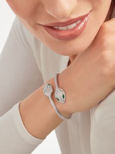 Serpenti 18 Kt White Gold Bracelet Set With Emerald Eyes And Pavé Diamonds.