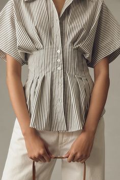 Tailored to perfection, the Tobie Shirt is on top of everyone’s mind – with its classic collar, exaggerated sleeves, and waist-defining pleats. | The Tobie Pleated Blouse by Exquise: Short-Sleeve Edition, Women's, Size: 1 X, Polyester/Cotton/Elastane at Anthropologie Exaggerated Sleeves, Pleated Shirt, Top Sewing Pattern, Pleated Blouse, Date Night Dresses, Work Blouse, Cozy Knits, Faux Fur Jacket, Cotton Blouses