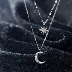 Indulge in the mesmerizing beauty of our double layer celestial pendant necklace, crafted with utmost care from luxurious 925 sterling silver and adorned with sparkling cubic zirconia pave. This exquisite piece features a shorter choker length necklace with a dazzling star charm and a longer crescent moon necklace. Elevate your jewelry collection with this delicate yet captivating moon and star necklace, perfect for everyday wear or as a heartfelt gift for your loved ones. Materials: 925 sterlin Moon And Star Pendant, Formal Necklace, Crescent Moon Necklace Silver, Celestial Pendant, Formal Ideas, Mesmerizing Beauty, Crescent Moon Pendant, Silver Jewelry Earrings, Star Pendant Necklace