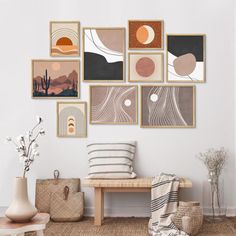 a living room filled with furniture and pictures on the wall