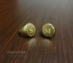 "Gold Signet Ring ✪ Gold Initial Ring ✪ Engraved Letter Ring ✪ Monogram Ring ✪ Chevalier Ring ✪ Signet Ring ✪Family Signet Ring ✪ Classic Man Ring ☛ Ring size as preferred, as it is custom created for you in our workshop. ☛ This ring can be personalized with ANY letter desired. Please leave us your message or note in order. ► Letter with WREATH around OR WITHOUT. ► Leave us note as following for example: \" LETTER A - without wreath \" ► Custom font, logo or different design possible after commu Classic Gold Oval Couple Rings, Gold Signet Ring With Name For Wedding, Gold Ring With Engraving Option, Gold Oval Couple Rings For Anniversary, Gold Oval Couple Promise Rings, Oval Gold Couple Rings For Anniversary, Oval Gold Couple Promise Rings, Gold Engraved Initials Ring In 14k, Gold Engraved Initial Open Ring