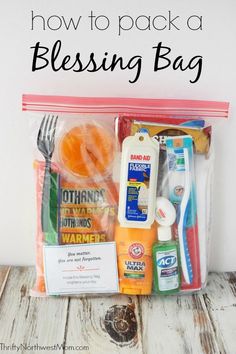 a bag filled with cleaning products and toothpaste on top of a wooden table