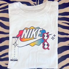 Super Cute T-Shirt W/Heart Glasses Nike Logo - Bright Colors Brand New - Never Worn Nike Retro T-shirt With Letter Print, Retro Nike T-shirt With Letter Print, Sporty Summer Tops With Cartoon Print, Cool White T-shirt With Funny Print, Multicolor Logo Print T-shirt For Spring, Cool White Tops With Graphic Design, Nike Summer Graphic Tee T-shirt, Nike Summer Graphic Tee, Retro Nike Tops With Graphic Print