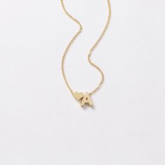 Dainty ♥ initial necklace - a meaningful piece of jewelry that is simple and stylish. D E T A I L S * Single initial size is approximately 5 x 7 mm * Chain is 14k gold fill, sterling silver, or 14k rose gold fill OR 14k gold plate, silver plate, or 14k rose gold plate * Charms are matte gold plate, matte silver plate, or shiny rose gold plate * This listing is for one necklace with two charms P R O M O T I O N * Bridesmaids gifts: message us for a coupon code * New FACEBOOK or INSTAGRAM follower Gold Initial Letter Necklace For Valentine's Day, Dainty Initial Pendant Charm Necklace For Mother's Day, Dainty Mother's Day Initial Pendant Charm Necklace, Dainty Initial Pendant Necklace For Mother's Day, Initial Pendant Necklaces For Valentine's Day, Initial Pendant Charm Necklaces For Mother's Day, Valentine's Day Initial Pendant Necklace With Adjustable Chain, Valentine's Day Personalized Initial Pendant Necklace, Mother's Day Initial Pendant Charm Necklace With Adjustable Chain