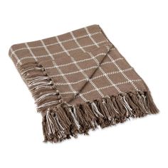 a brown and white checkered blanket with fringes