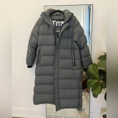 Great Condition Superpuff/Super Puff Jacket From Aritzia With The Original Tna Logo. Size Large. Sold Out Grey/Gray Blue Color. It’s Missing The Back Of A Snap Closure On One Of The Side Vents (Pictured) And Has Two Marks (Both Pictured, One On Left Shoulder Blade And One On Left Side Of Hood). Selling Because I Have Another And I Just Don’t Need Two! Price Firm, Retails For $350 Aritzia Superpuff, Aritzia Jacket, Super Puff, Puff Jacket, Long Jacket, Just Don, Snap Closure, Blue Grey, Jackets For Women