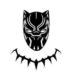 a black panther mask with fangs on it's face