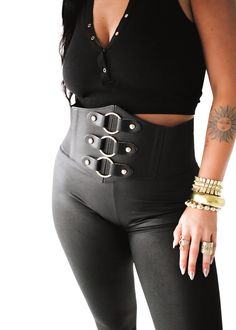 We know you've seen statement belts making a comeback. And you might be thinking, but can I pull that off? The answer is YES. And we're here with just the right. pieces to show you how. Elastic Back with Faux Leather Measures 38.5" from Snap to Snap Naturally - Extends Comfortably to a 46" Waist Burnished Gold Hardware Edgy Black Belt Buckle With Removable Belt, Edgy Black Belt Buckles, Trendy Corset Belt With Belt Loops For Party, Edgy Black Belt For Night Out, Trendy Adjustable Corset Belt With Belt Loops, Statement Belts, Corset Plus Size, Statement Jewelry Necklace, Jewelry Casual