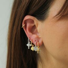 Make your ears the talk of the town with our Earring Charm! Change up your vibe with your charms – mix and match or stack 'em up! Our charms are perfect for pairing with our Tiny Hoops to give you the cutest touch. Get creative and show off your style! نظارات شمسية, Hoop Charms, Talk Of The Town, Waist Chain, The Talk, Get Creative, Belly Rings, Cz Stone, Charm Earrings